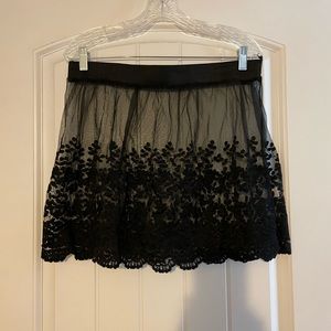 NWOT Black shirt extender or short skirt. Sexy black lace.
